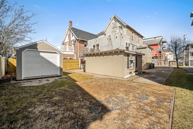 208 E Maple Ave, Wildwood, NJ 08260 - view of home's exterior featuring an outbuilding, a yard, and a garage