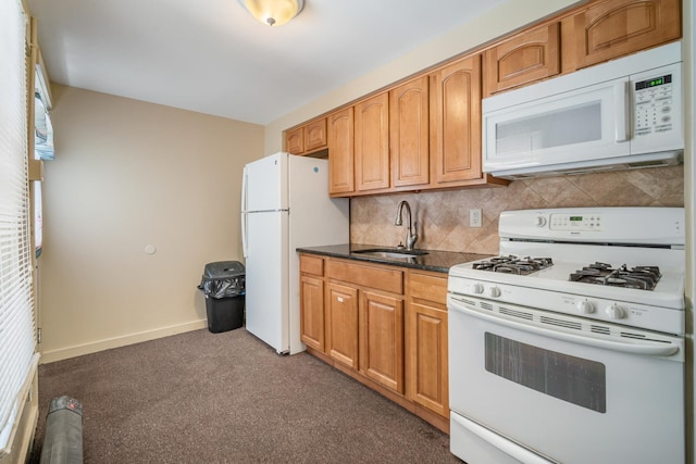 208 E Maple Ave, Wildwood, NJ 08260 - kitchen with sink, white appliances, and decorative backsplash