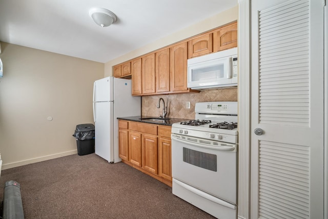 208 E Maple Ave, Wildwood, NJ 08260 - kitchen with dark colored carpet, sink, backsplash, and white appliances