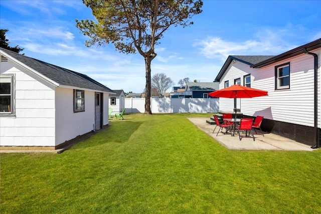 view of yard with a patio and fence