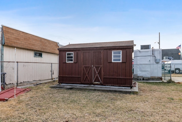 view of shed featuring a fenced backyard