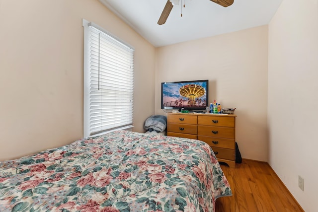 bedroom featuring a ceiling fan and light wood-style floors