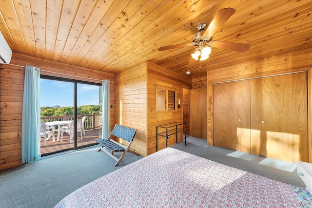 304 Alexander Ave, Cape May Point, NJ 08212 - carpeted bedroom featuring access to outside, wooden ceiling, wooden walls, ceiling fan, and a closet