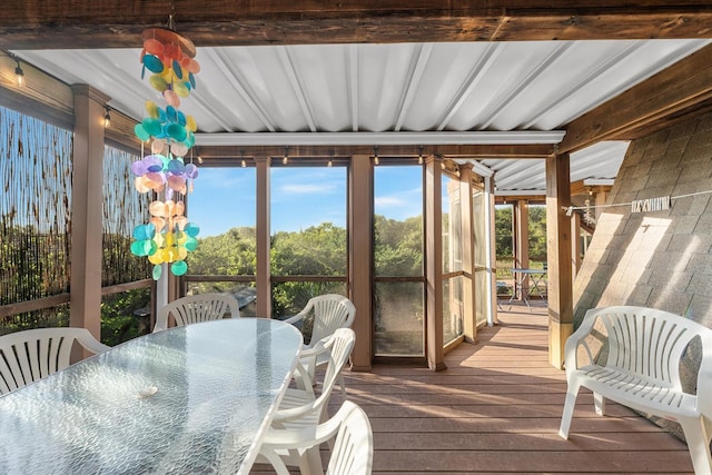 304 Alexander Ave, Cape May Point, NJ 08212 - sunroom / solarium with wood-type flooring, plenty of natural light, a wooden deck, and beam ceiling