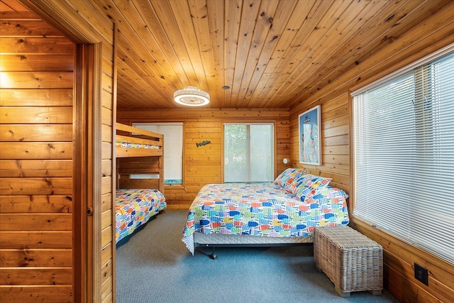 304 Alexander Ave, Cape May Point, NJ 08212 - carpeted bedroom featuring wood walls and wooden ceiling