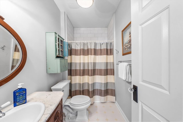 full bathroom with toilet, vanity, and a shower with shower curtain