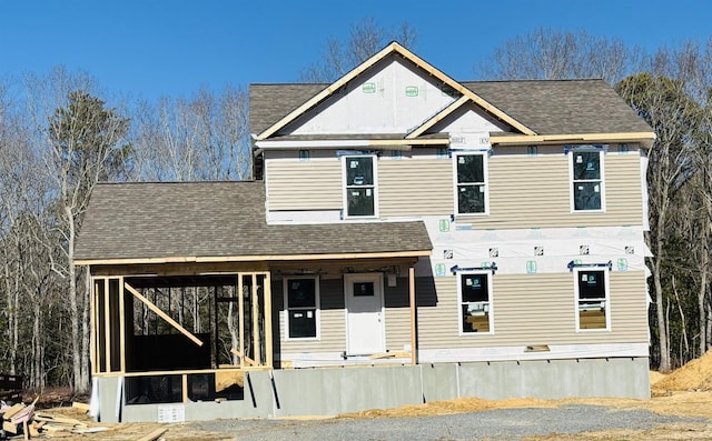 view of front of house featuring a shingled roof