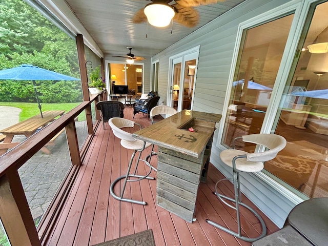 46 Summer Cir, North Cape May, NJ 08204 - wooden deck with a ceiling fan