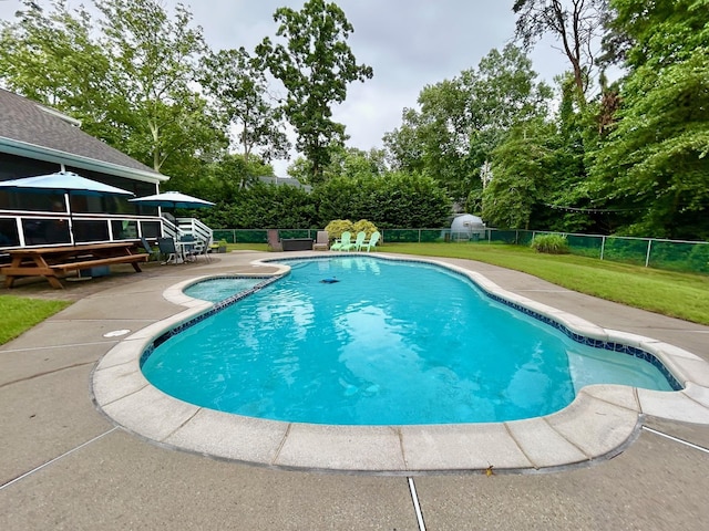 46 Summer Cir, North Cape May, NJ 08204 - view of pool with a patio, a pool with connected hot tub, and view of scattered trees