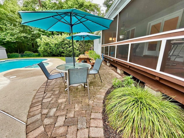 46 Summer Cir, North Cape May, NJ 08204 - swimming pool featuring a patio area, a sunroom, and outdoor dining area