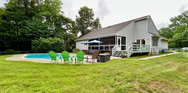 46 Summer Cir, North Cape May, NJ 08204 - rear view of property featuring a sunroom, a wooden deck, and a patio area