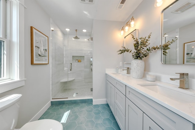 599 22nd St Unit 599, Avalon, NJ 08202 - bathroom with tile patterned flooring, double vanity, a shower stall, and recessed lighting