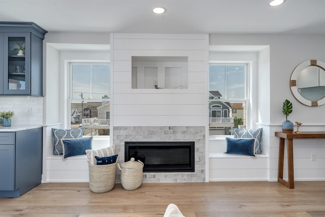 599 22nd St Unit 599, Avalon, NJ 08202 - living room with light wood-type flooring, recessed lighting, and a glass covered fireplace