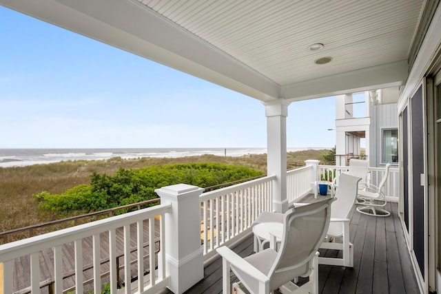 73 E 25th St, Avalon, NJ 08202 - wooden deck featuring view of water and beach