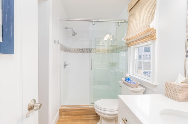 328 83rd St, Stone Harbor, NJ 08247 - bathroom featuring a stall shower, wood finished floors, and vanity