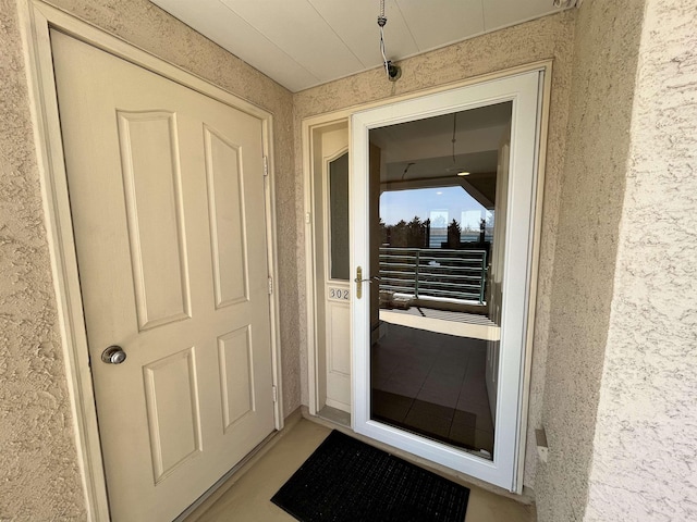 9400 Roberts Ave Unit 302, Sea Isle City, NJ 08243 - doorway to property featuring stucco siding