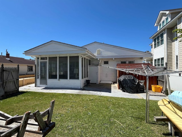 305 E Saint Paul Ave, Wildwood Crest, NJ 08260 - back of property featuring a sunroom and a patio area