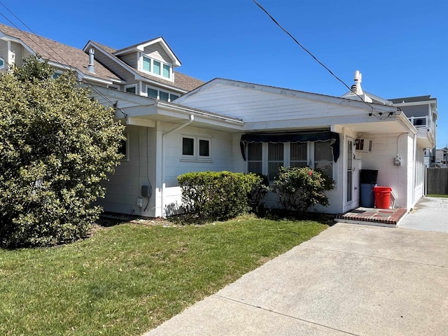 305 E Saint Paul Ave, Wildwood Crest, NJ 08260 - view of front of home with a front yard and driveway