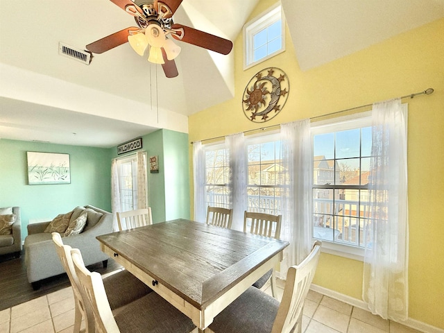 dining room featuring ceiling fan and light tile patterned floors