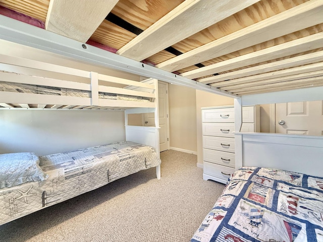 bedroom with light colored carpet