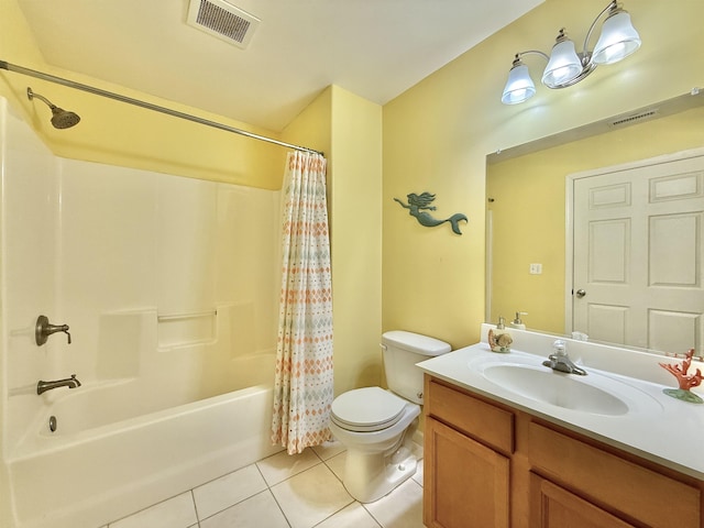 full bathroom featuring tile patterned floors, toilet, vanity, and shower / bath combo