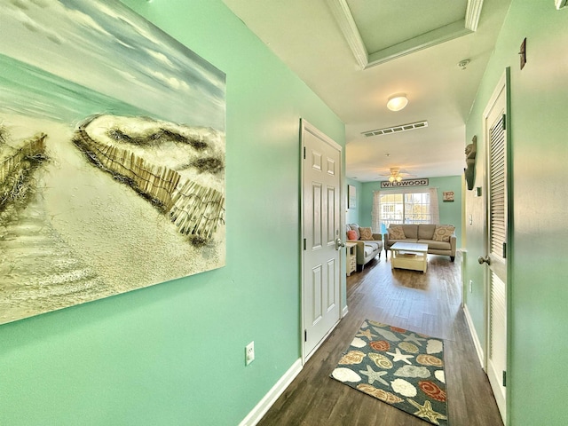 hallway featuring dark hardwood / wood-style flooring