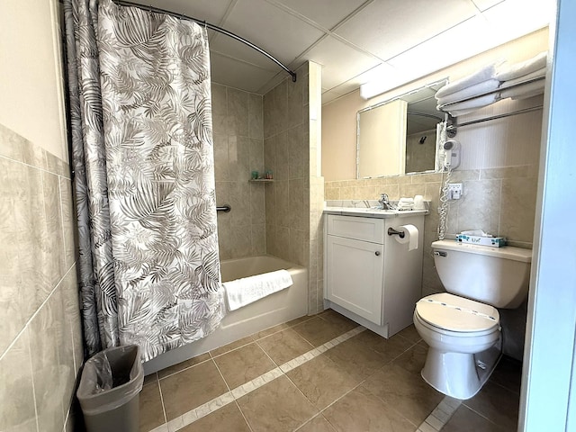9103 Atlantic Ave Unit 413, Wildwood Crest, NJ 08260 - bathroom with tile walls, tile patterned floors, shower / bath combo, and vanity
