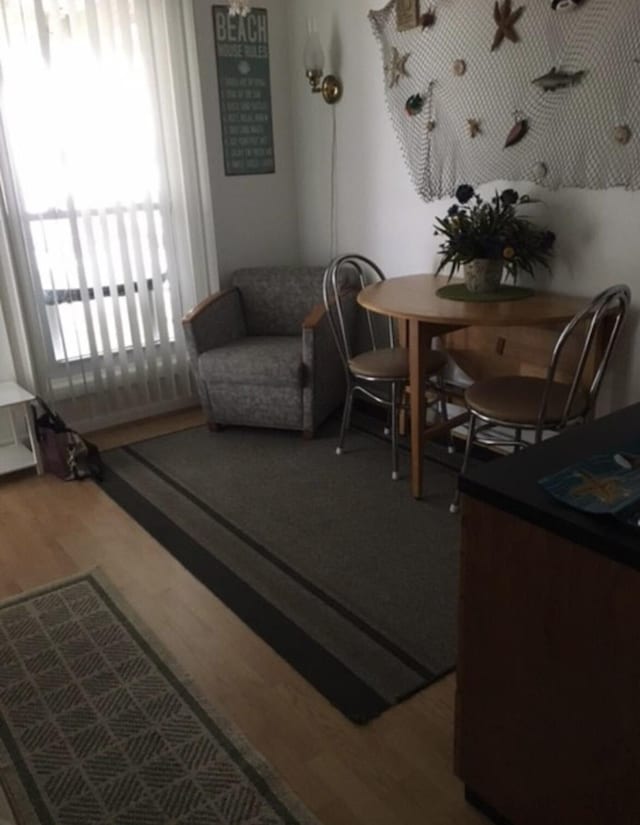 sitting room with wood finished floors