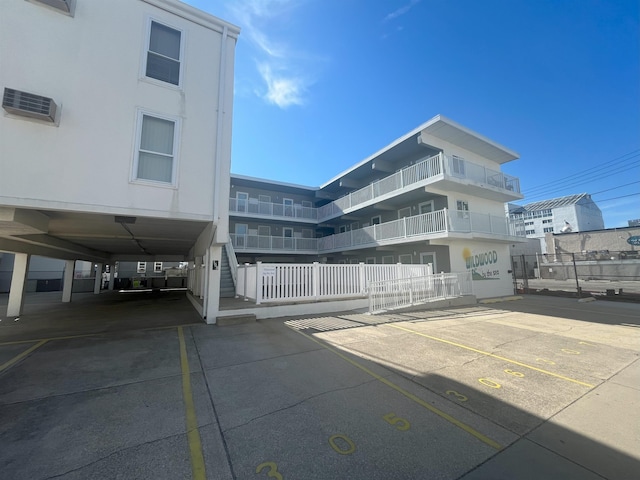 view of property featuring fence