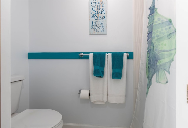 full bathroom featuring toilet