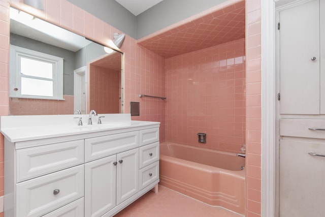 bathroom featuring vanity and washtub / shower combination