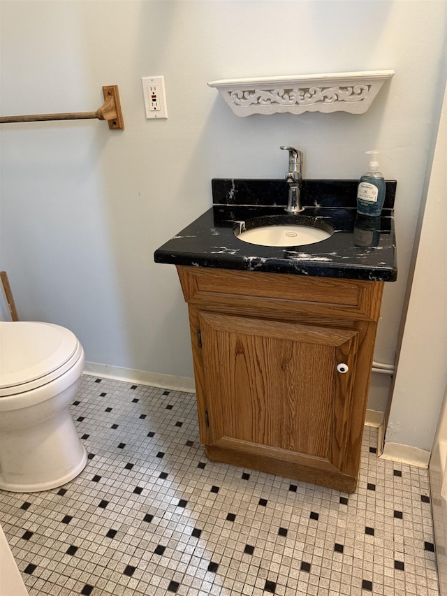 207 W Maple Ave, Wildwood, NJ 08260 - bathroom featuring vanity, baseboards, toilet, and tile patterned floors