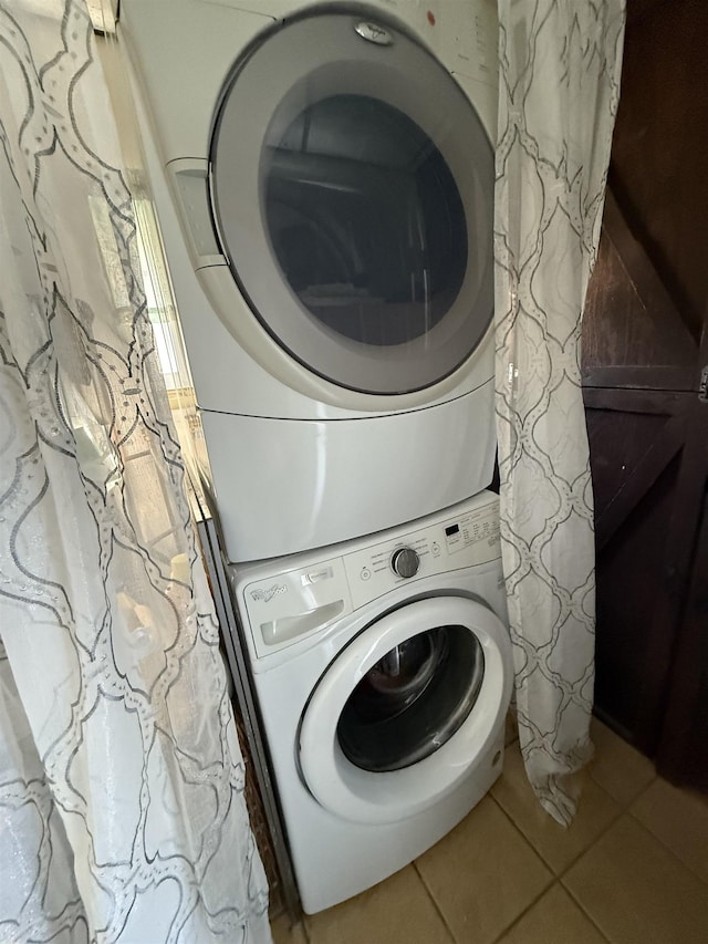 207 W Maple Ave, Wildwood, NJ 08260 - washroom featuring stacked washing machine and dryer and tile patterned floors