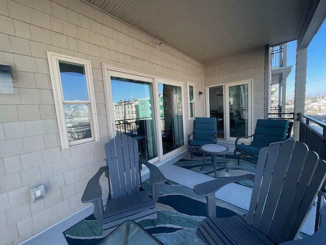 view of patio / terrace featuring a balcony