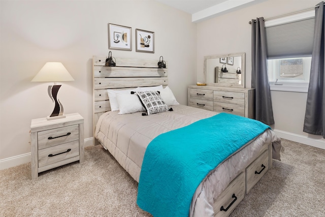 bedroom with light colored carpet