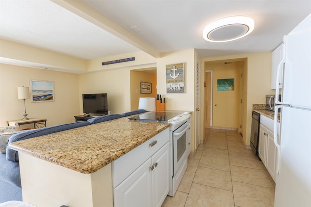 kitchen with white cabinets, light tile patterned flooring, light stone countertops, and white appliances