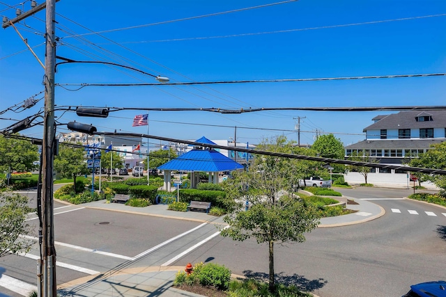 2025 Dune Dr Unit 2025, Avalon, NJ 08202 - view of asphalt street with traffic lights, street lights, sidewalks, and curbs