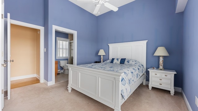 2025 Dune Dr Unit 2025, Avalon, NJ 08202 - bedroom featuring light colored carpet, high vaulted ceiling, connected bathroom, and ceiling fan
