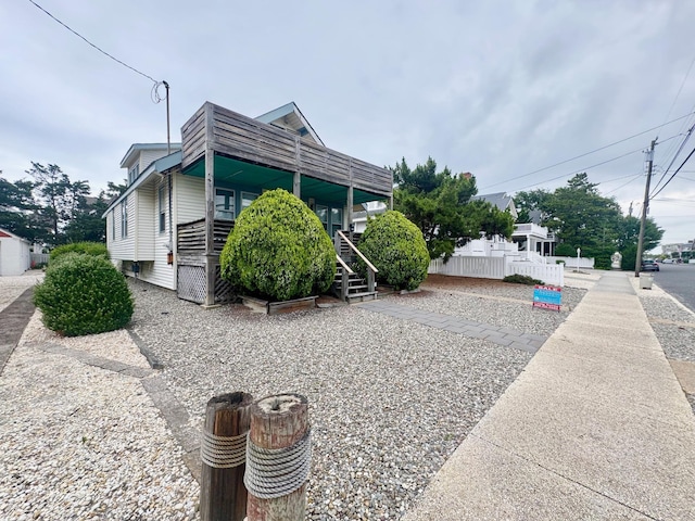 55 W 22nd St, Avalon, NJ 08202 - view of side of property featuring stairs