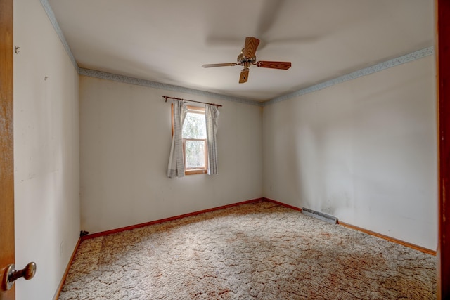 unfurnished room with ceiling fan and carpet flooring