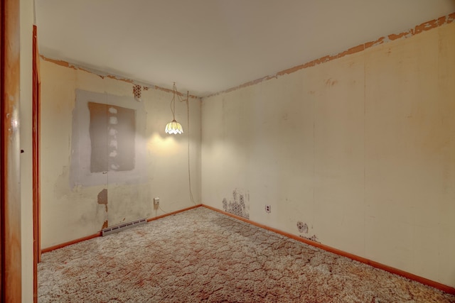 empty room with carpet flooring