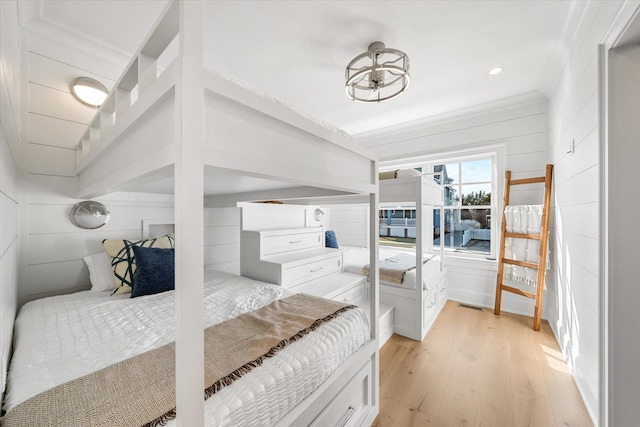 bedroom with light wood-type flooring