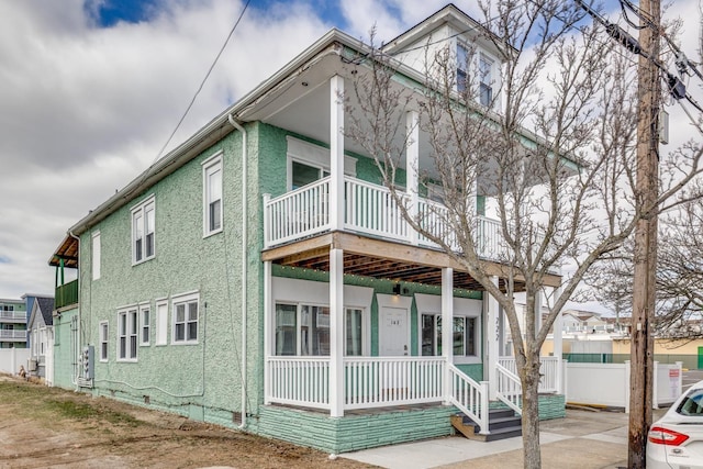 222 E Burk Ave Unit 4, Wildwood, NJ 08260 - view of front of house featuring fence and covered porch