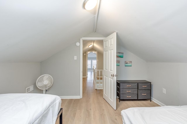 222 E Burk Ave Unit 4, Wildwood, NJ 08260 - bedroom with light wood-style floors, vaulted ceiling, and baseboards