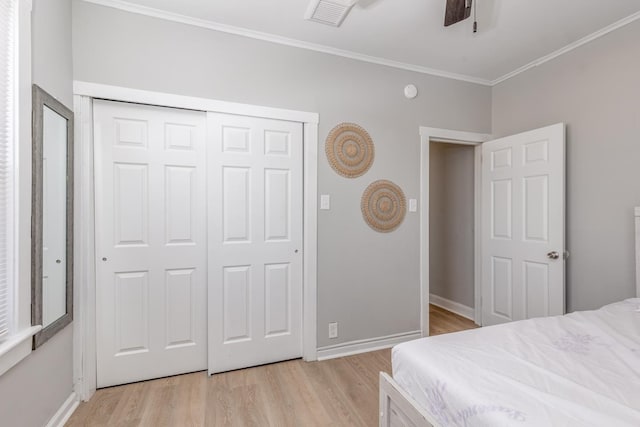 222 E Burk Ave Unit 4, Wildwood, NJ 08260 - bedroom with light wood-type flooring, ornamental molding, baseboards, and a closet