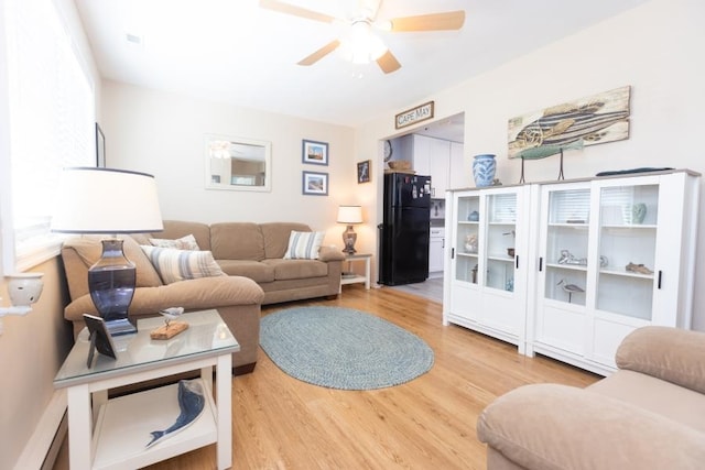 213 Hollywood Ave, Villas, NJ 08251 - living area featuring ceiling fan and light wood-style flooring