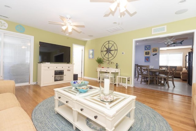 213 Hollywood Ave, Villas, NJ 08251 - living room featuring a ceiling fan and light wood-style flooring