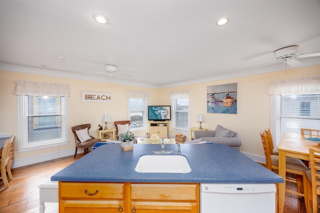 kitchen with sink, crown molding, white dishwasher, ceiling fan, and hardwood / wood-style floors