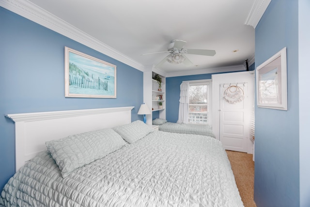 carpeted bedroom with crown molding and ceiling fan