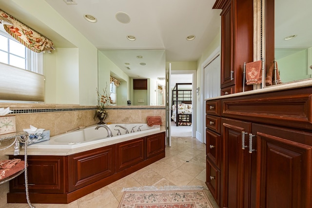 2404 Atlantic Ave, Longport, NJ 08403 - bathroom featuring a garden tub, tile patterned floors, vanity, and recessed lighting